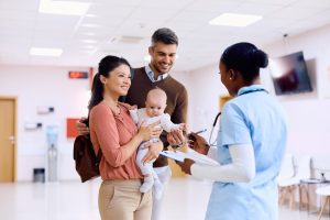 female doctor with family patients